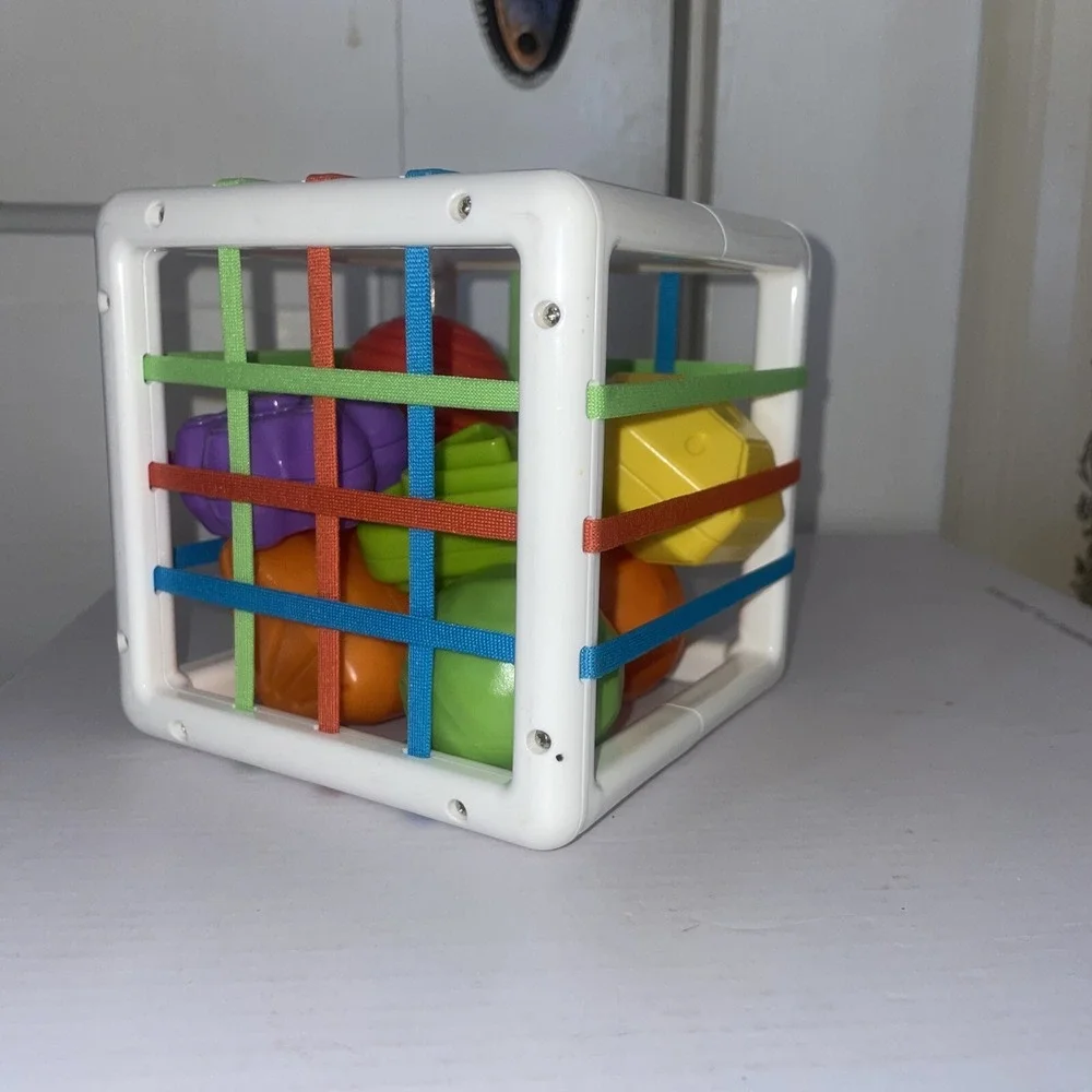 Sensory Brain Development‎ Toy Elastic Bands Push Thru Shapes & Colors Textures